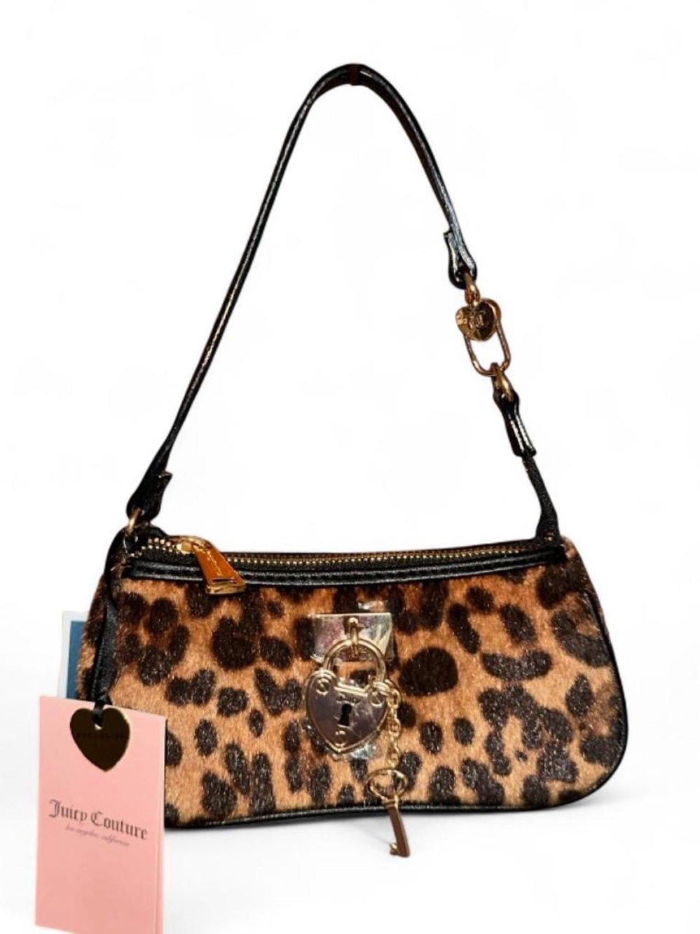 Juicy Couture “Lock n Key Convertible Baguette Wristlet”, leopard print